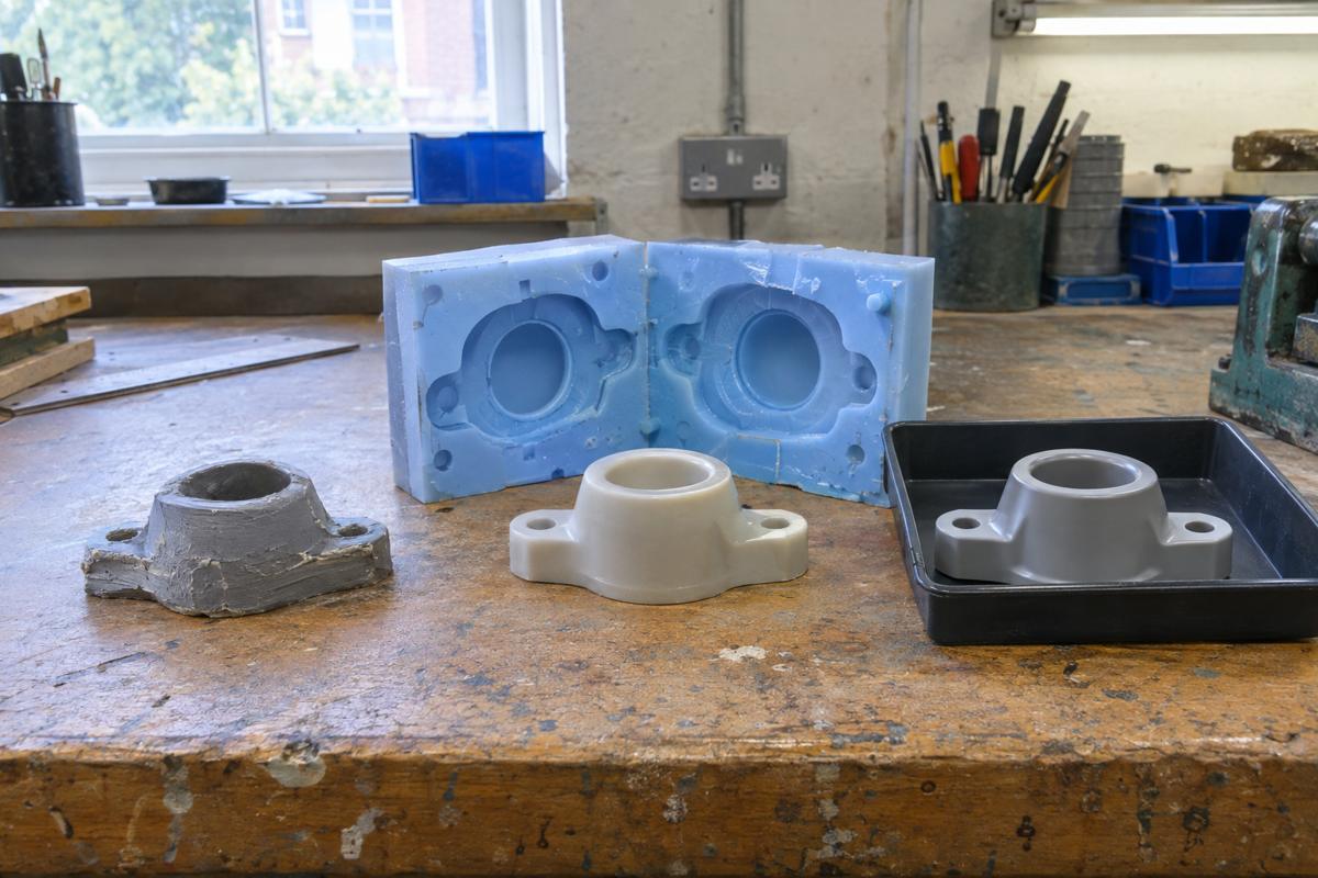 A part progressing from rough prototype to production-ready version