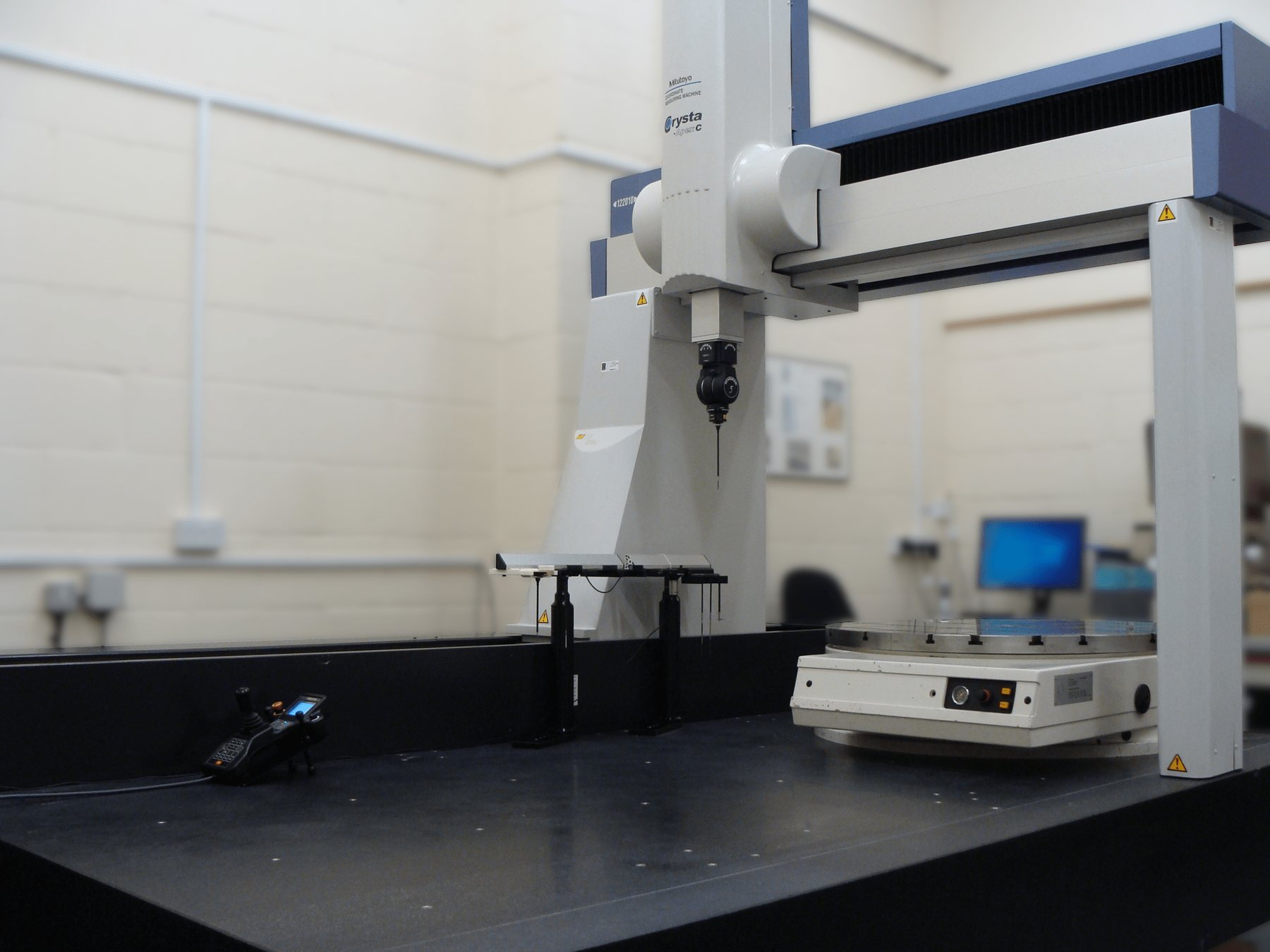 Five-axis scanning coordinate measuring machine (CMM).